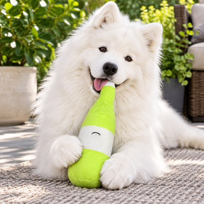 Green wine bottle plush toy with a Samoyed on a patio