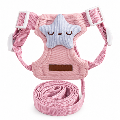 Pink star dog harness and matching leash on a white background